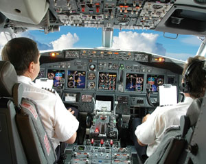 Pilot in Airplane Cockpit Photo