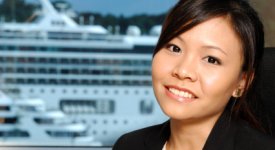 Crew Member Posed by Cruise Ship Photo Button
