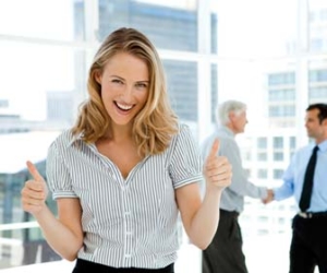 Successful recruiter giving two thumbs up picture