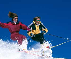 Couple Skiing Powder in Sun Valley Idaho