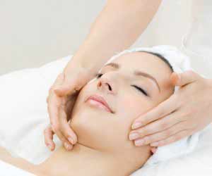 Cosmetologist Working on Woman's Face at Spa
