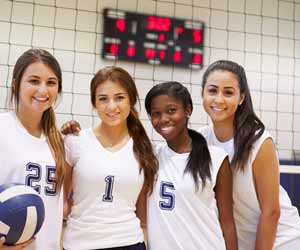 Volleyball Players Pose for Photo