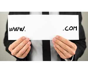 Man in suit holding a blank domain name sign with only the "www." and ".com"