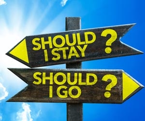 Opposite signs asking "should I Stay?" or "Should I Go?"