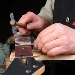A Luthier Constructs Various Stringed Instruments Like Guitars and Violins