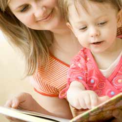 Au Pair Reading with Young Child Photo