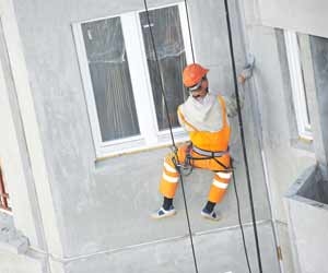 Rope Access Workers Utilize Ropes and Pulleys to Reach High Up Places