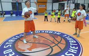 Basketball Coach Teaching Drills at China Basketball Camp